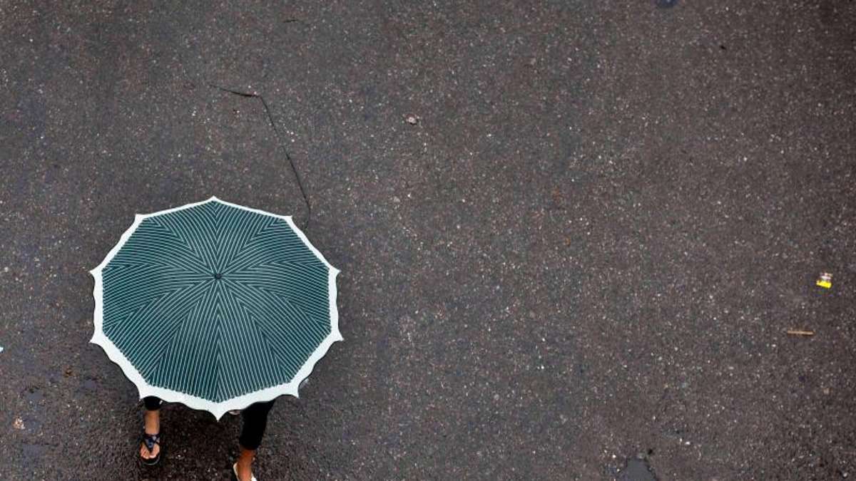 Thüringen: Sonnencreme und Regenschirm benötigt: Wettermix bleibt