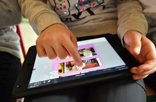 Tablets sind aus dem Unterricht nicht mehr wegzudenken. Foto: picture alliance/dpa/Martin Schutt